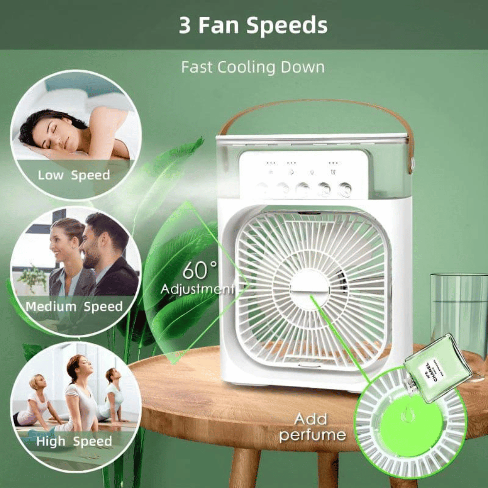 Portable fan with three speed settings on a wooden table against a green background