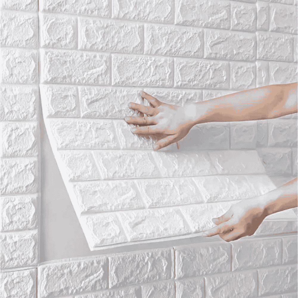 Front view of applying 3D brick wall sticker to a wall