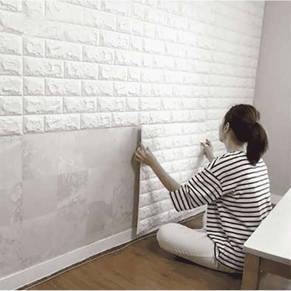 Room view displaying installed 3D brick wall stickers