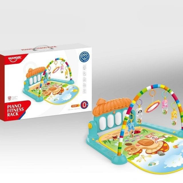 Piano toy shown alongside its box