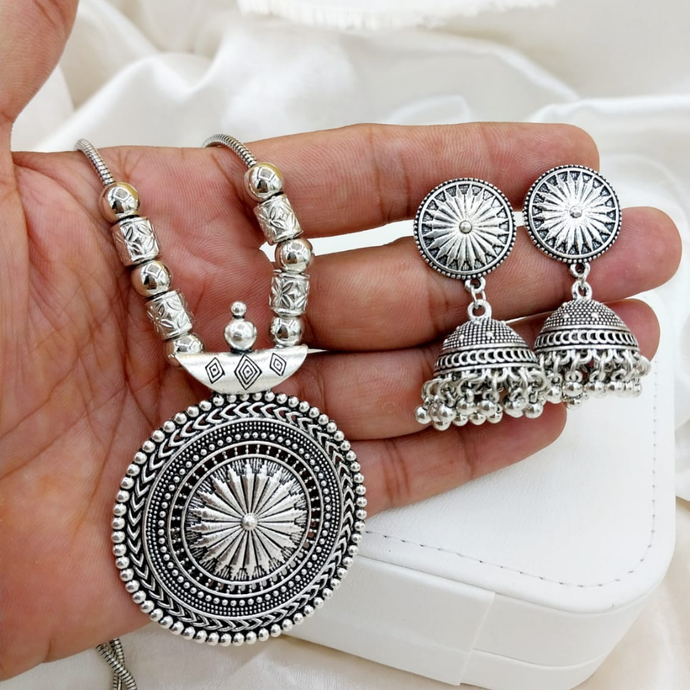 Left angle front view of silver China antique necklace set