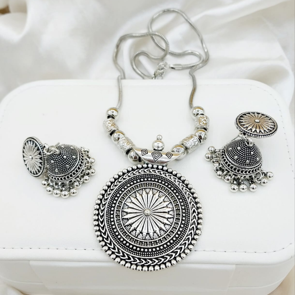 Left angle front view of silver China antique necklace set