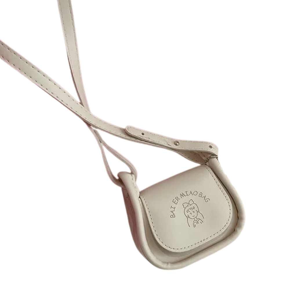 Beige crossbody bag with a strap on a white background