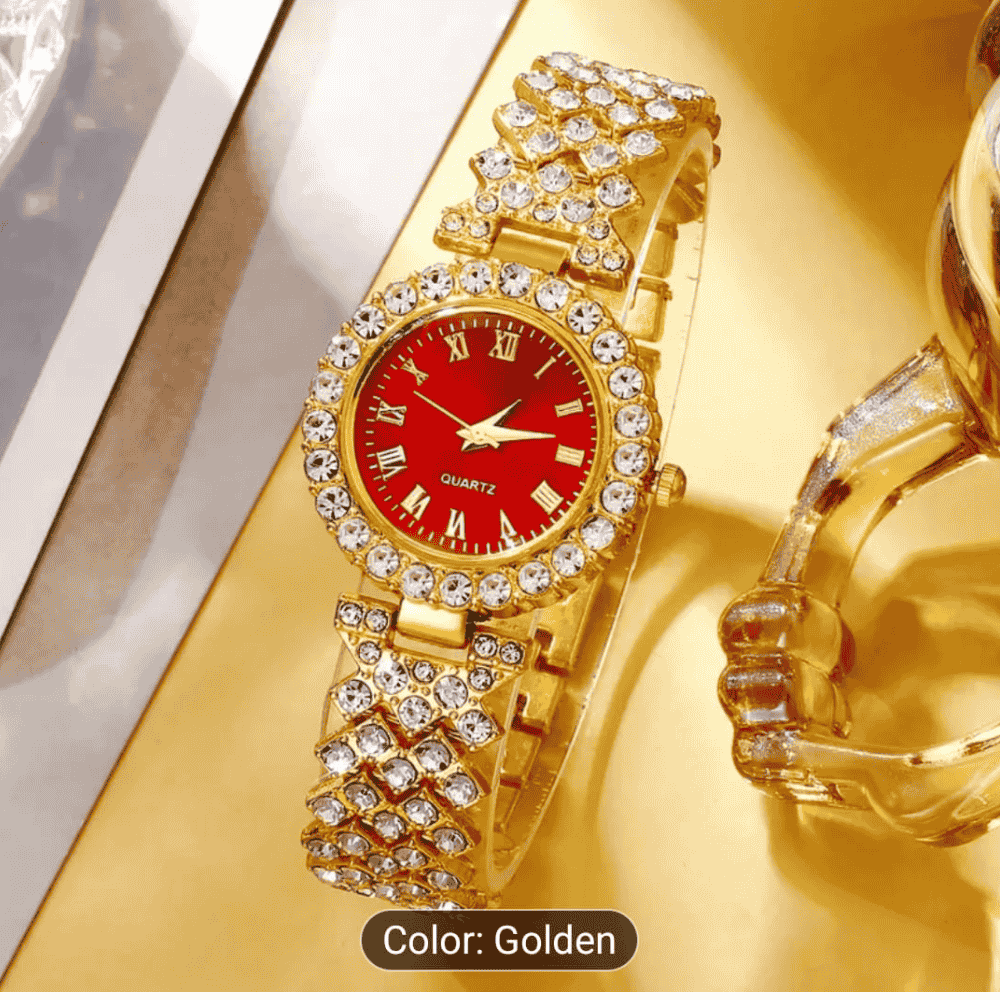 Close-up front view of elegant gold and red chain-style wristwatch