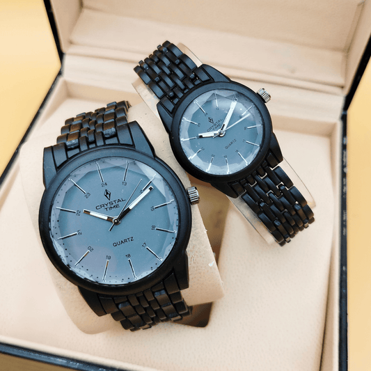 Front view showcasing the black matte couple watch with a light gray dial.