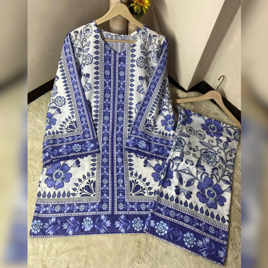 Blue and white floral patterned fabric on hangers against a neutral wall.