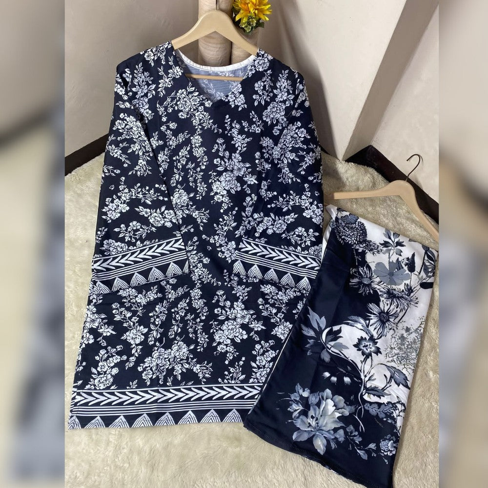 Navy blue and white floral dress with matching pants on a hanger against a neutral background.