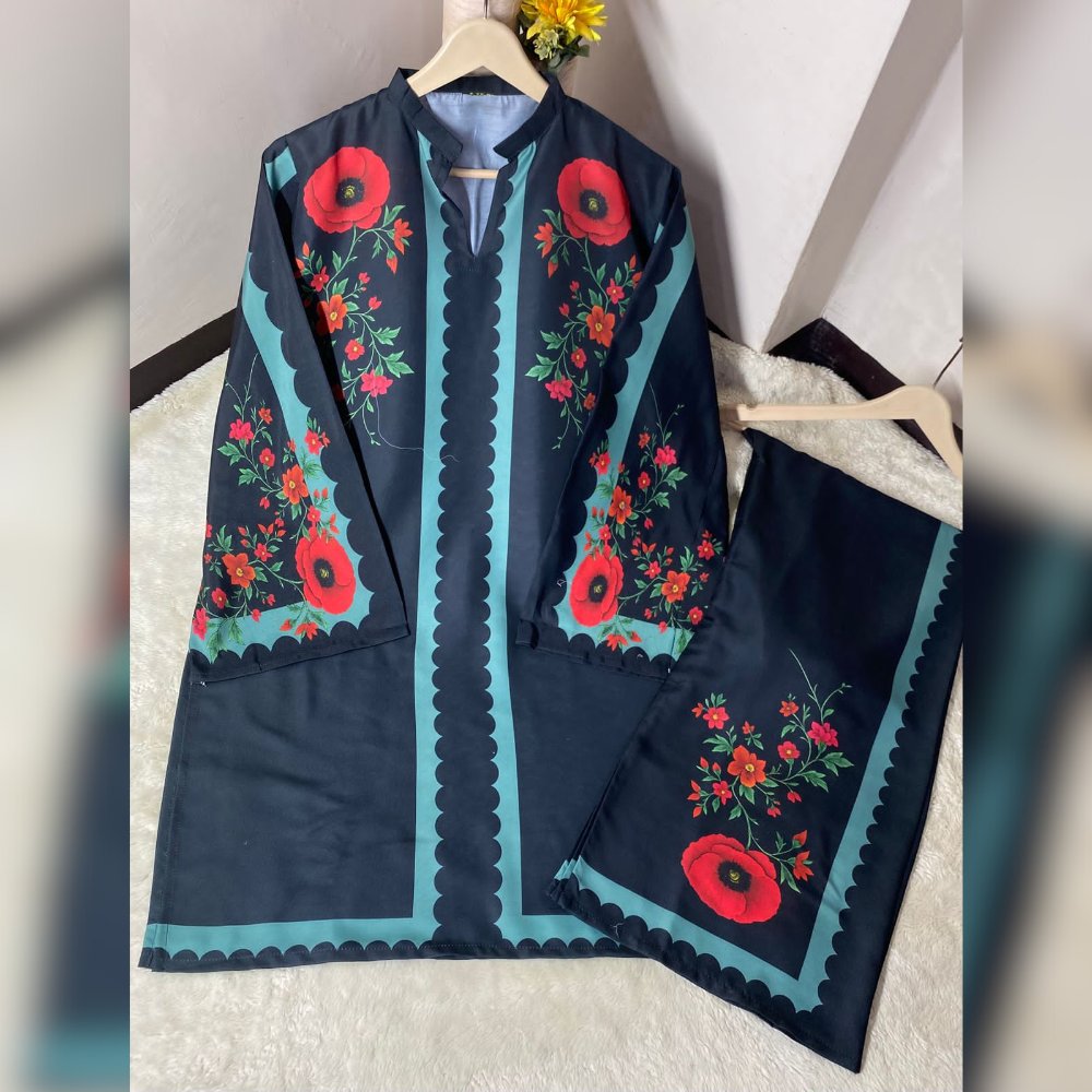 Navy blue embroidered outfit with red floral patterns on a hanger.