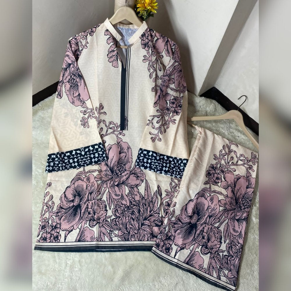 Floral patterned outfit on a hanger against a neutral background