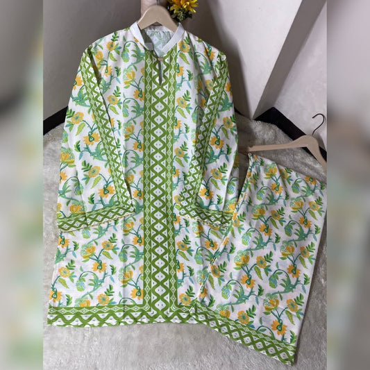 Floral and geometric patterned outfit on a hanger against a neutral background