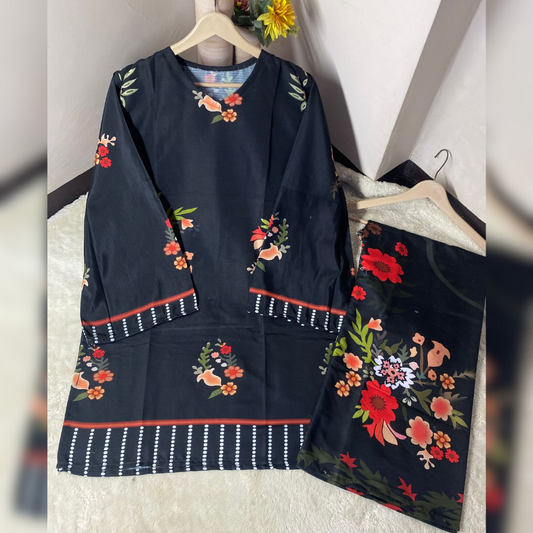Navy blue dress with floral embroidery on a hanger against a white wall.