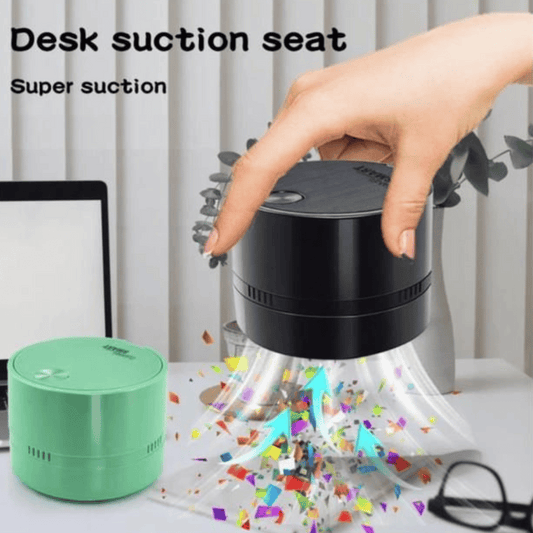 Desk suction seat with a hand holding it, showing its ability to pick up confetti.