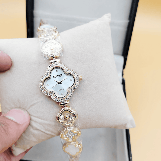 Front view of the Eyki ladies watch in gold finish