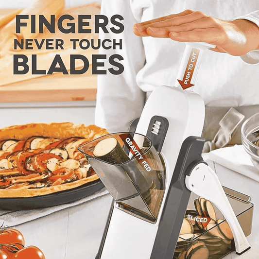 Finger never touching blades of spring slicer