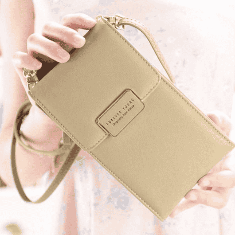 Closeup view of Forever Young light brown clutch with detailed stitching
