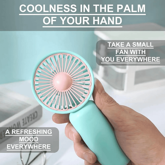 Handheld fan held by a hand with promotional text on a light blue background