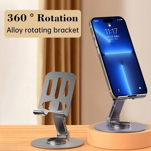 360-degree rotation alloy phone holder with a smartphone on a wooden surface.