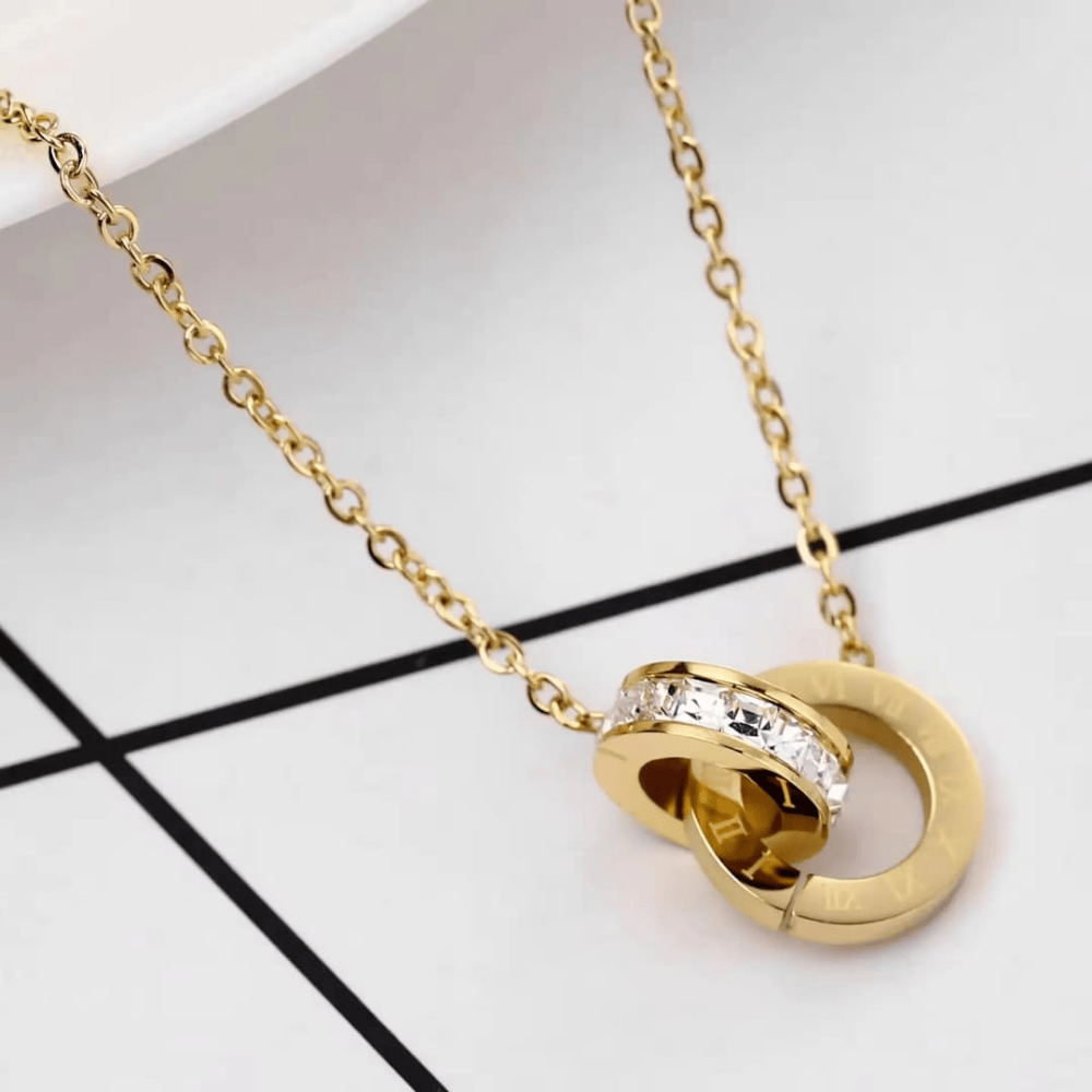 Detailed image of gold locket set under white lighting