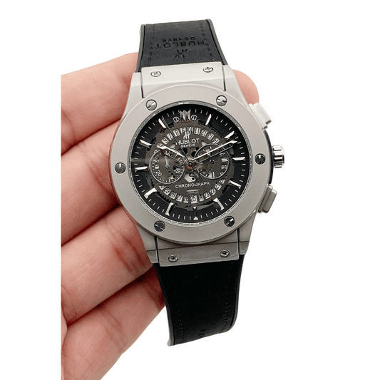 Hublot date watch with silver dial and black strap
