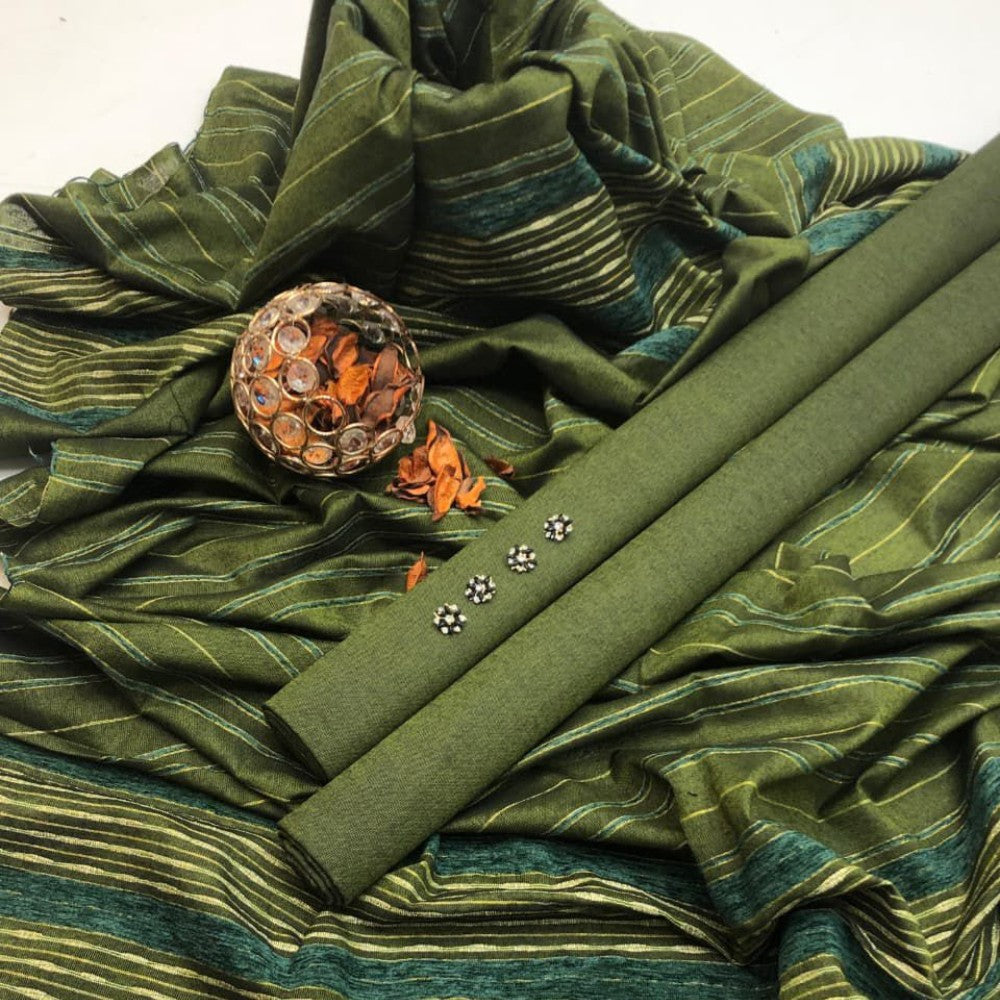 Green fabric with decorative elements on a white background