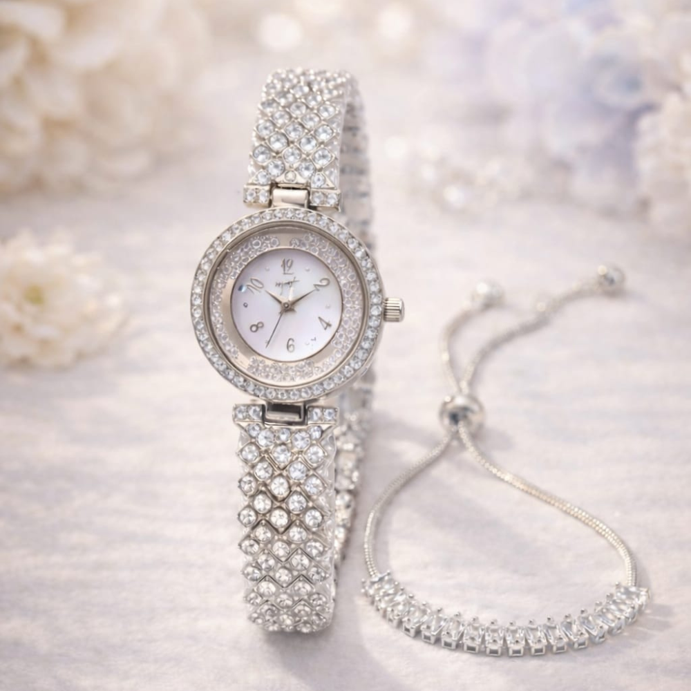 Silver watch with diamond-studded strap on a soft, blurred background