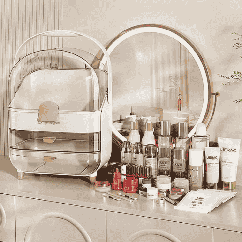 Cosmetic collection on a vanity with a large round mirror and organizer.