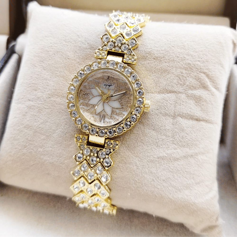 Close-up of MH Stone golden ladies jewellery watch