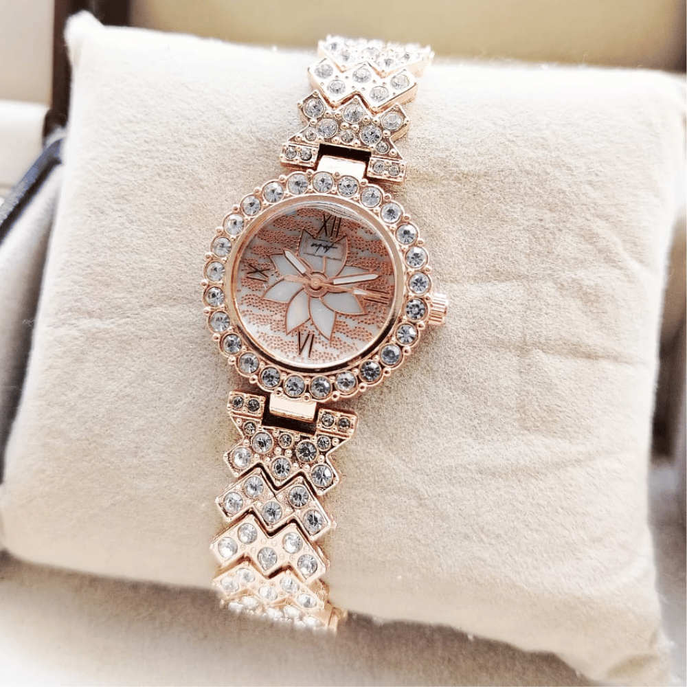 Front view of MH Stone rose gold ladies jewelery watch.