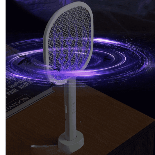 Mosquito killer racket standing upright with UV light glowing in darkness