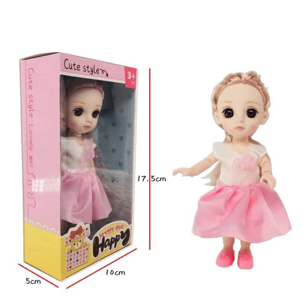 Doll shown outside the box next to its packaging