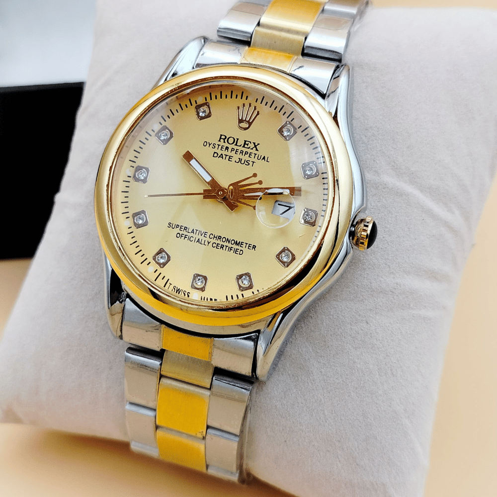Detailed close-up showing the golden accents on the silver body.