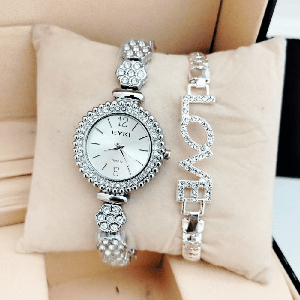 silver ladies watch with love crystal bracelet on cushion display