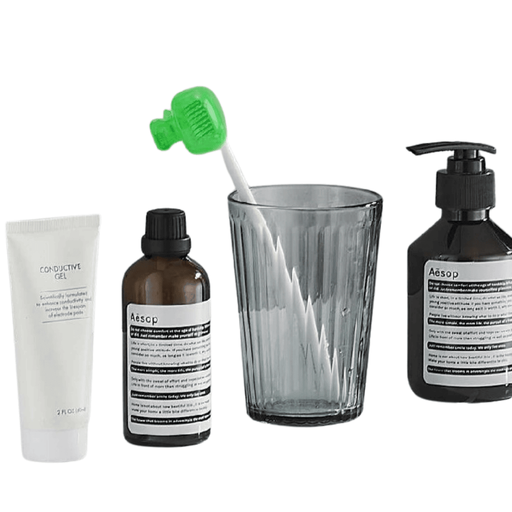 Toothbrush with protective cover standing inside a glass holder