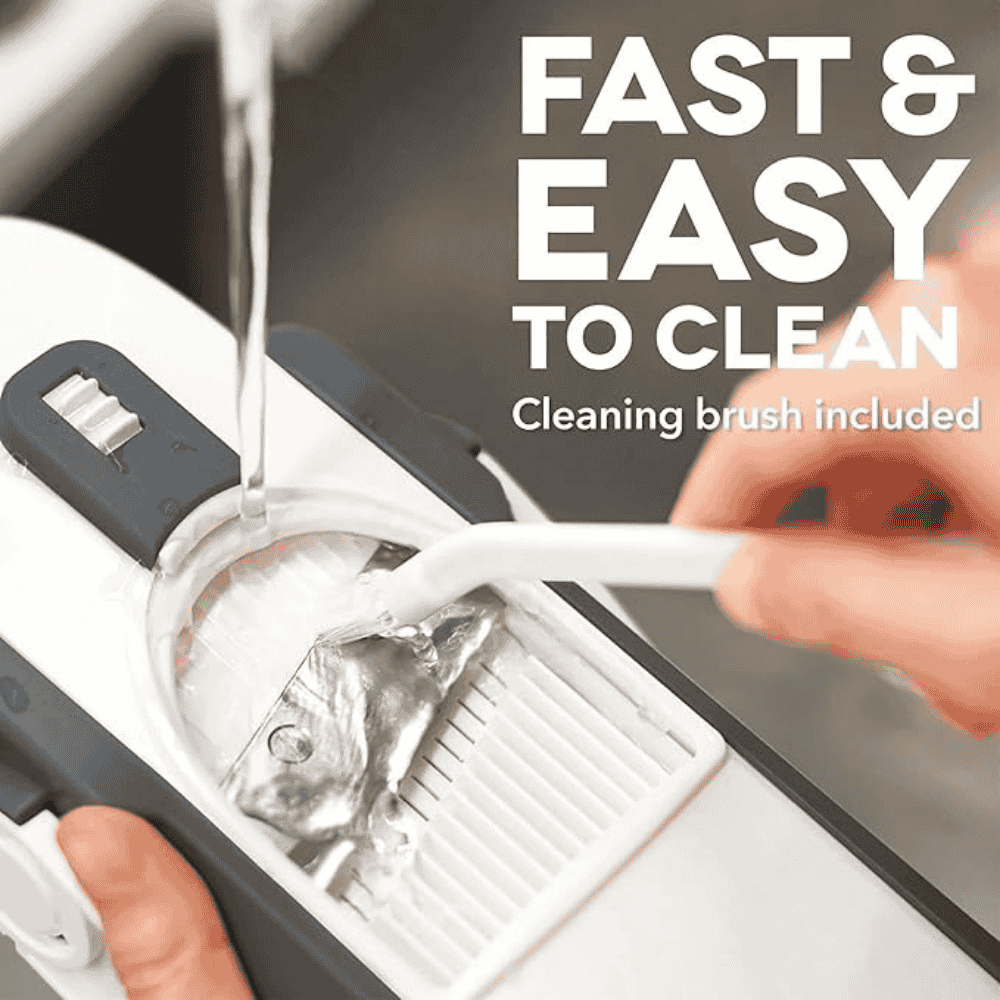 Vegetable slicer being cleaned with brush