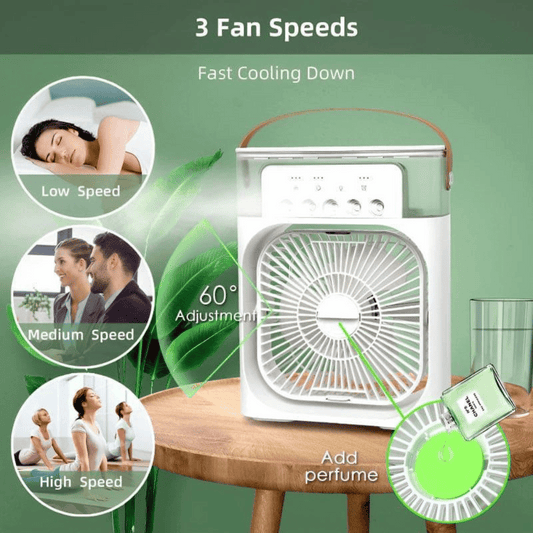 Portable fan with three speed settings on a wooden table against a green background