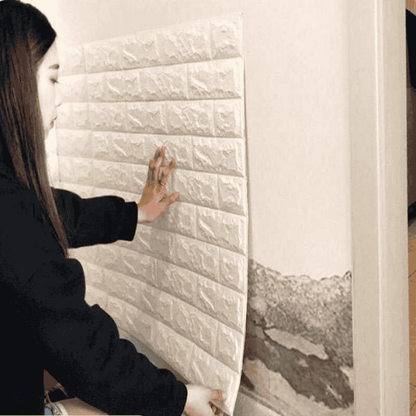 Side view of installing 3D brick wall sticker on a surface