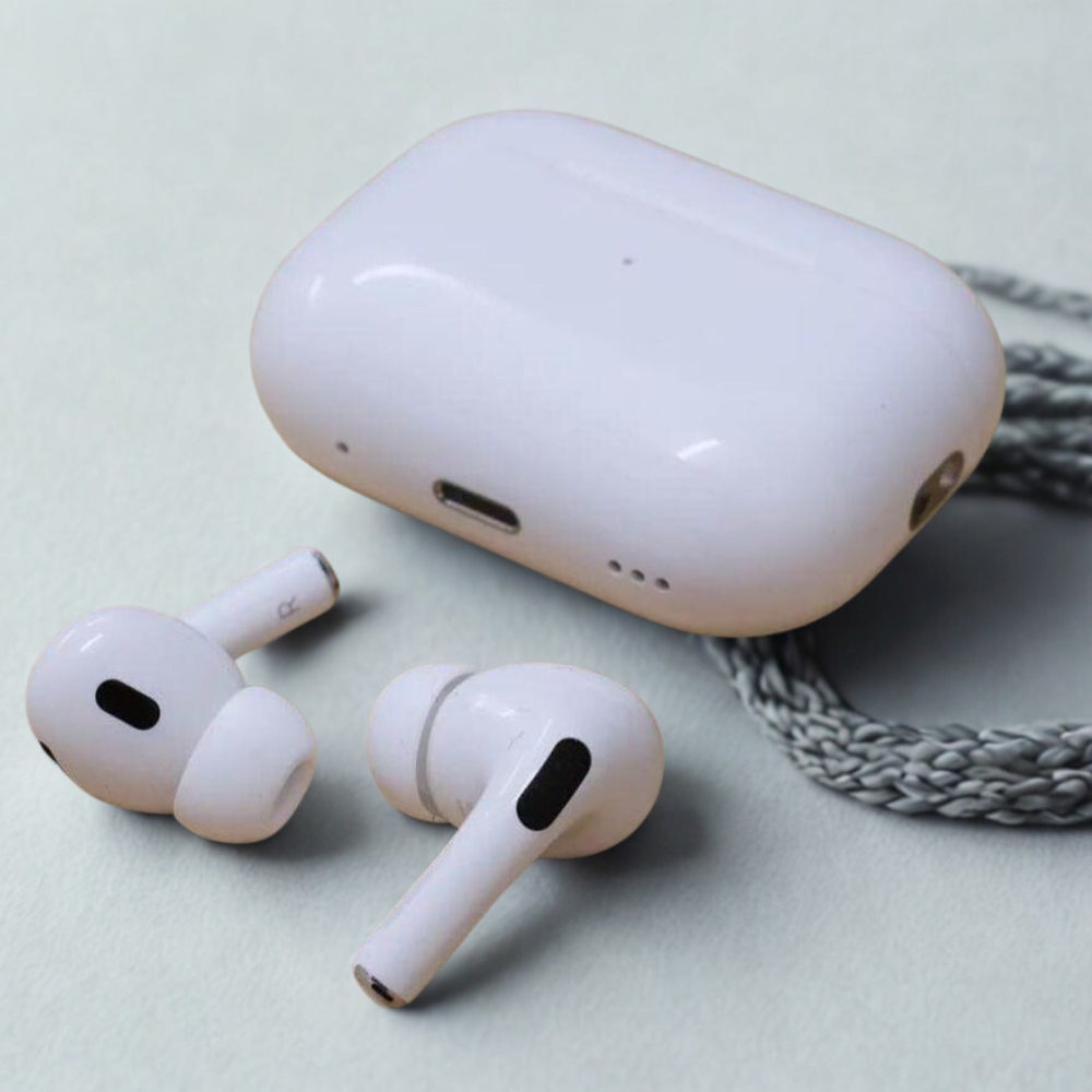 White wireless earbuds with charging case on a light gray background
