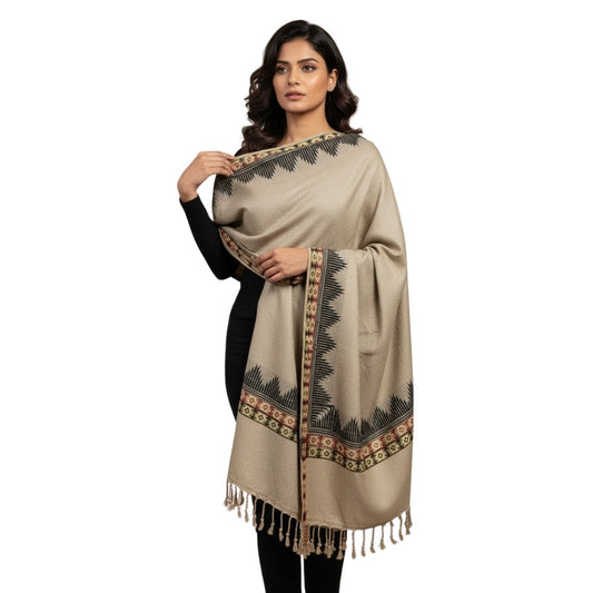 Woman wearing a beige patterned scarf on a white background