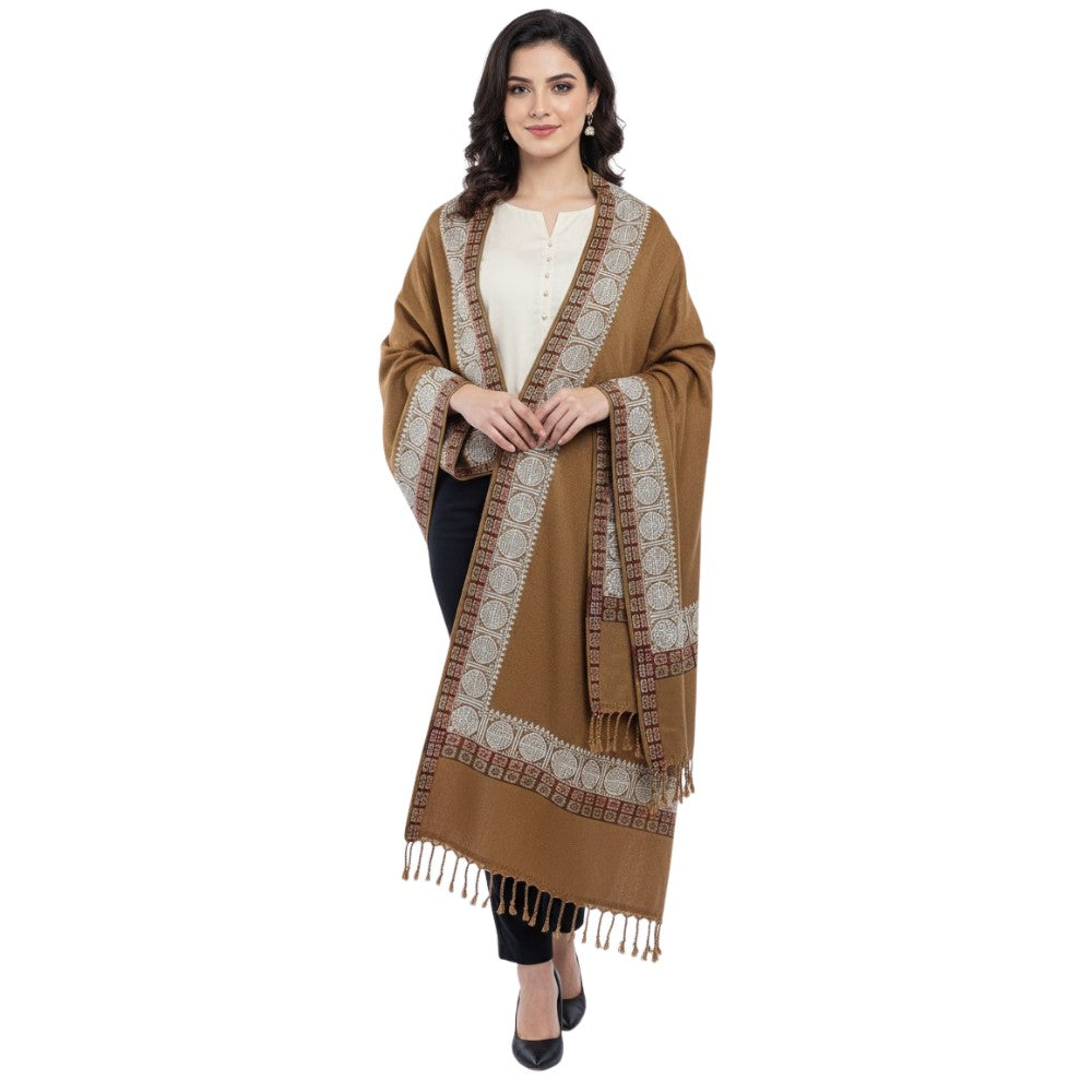 Woman wearing a brown patterned shawl on a white background