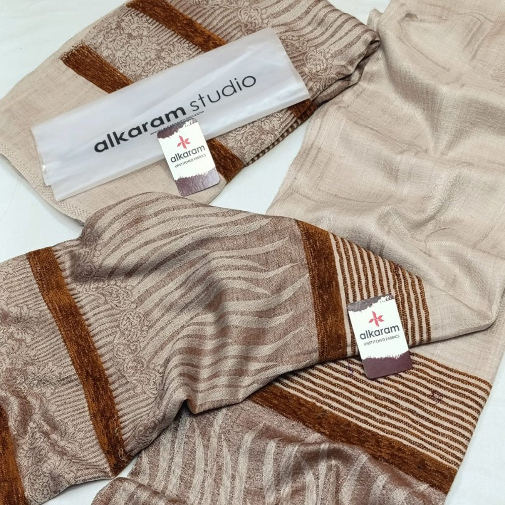 Textile products with 'alkaram studio' branding on a white background