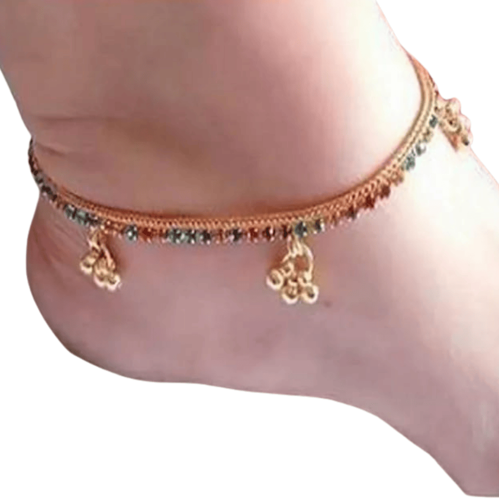 Left leg side view of multi-color gold plated anklet