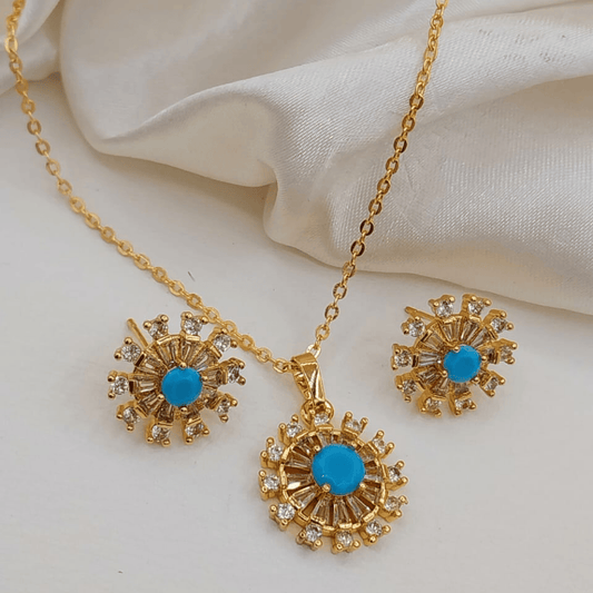 Blue artificial jewelry set with round locket and earrings