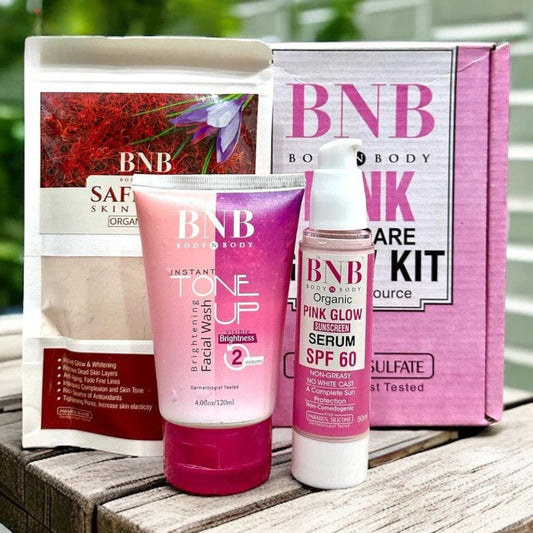 BNB skincare products including a serum and cleanser with packaging in the background.