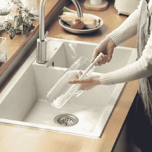 Silicone bottle brush used for cleaning in kitchen sink