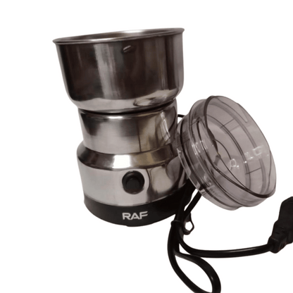 Stainless steel camping stove with a clear lid on a white background