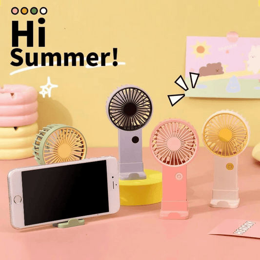 Colorful handheld fans with a smartphone on a pink surface, 'Hi Summer!' text on a yellow background.