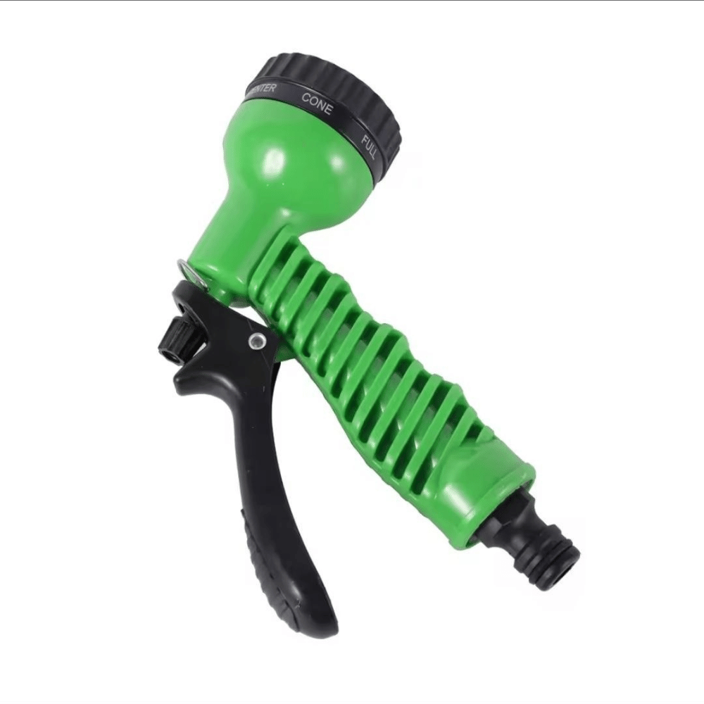 Green and black garden hose nozzle on a white background