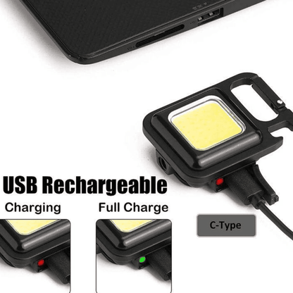 COB flashlight connected to USB for recharging