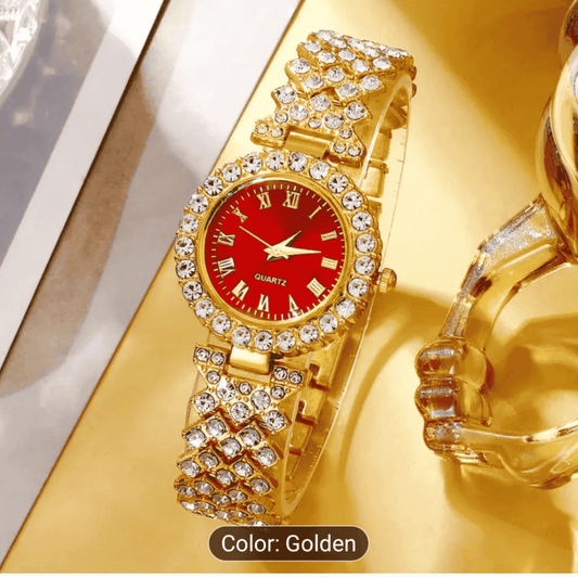 Close-up front view of elegant gold and red chain-style wristwatch