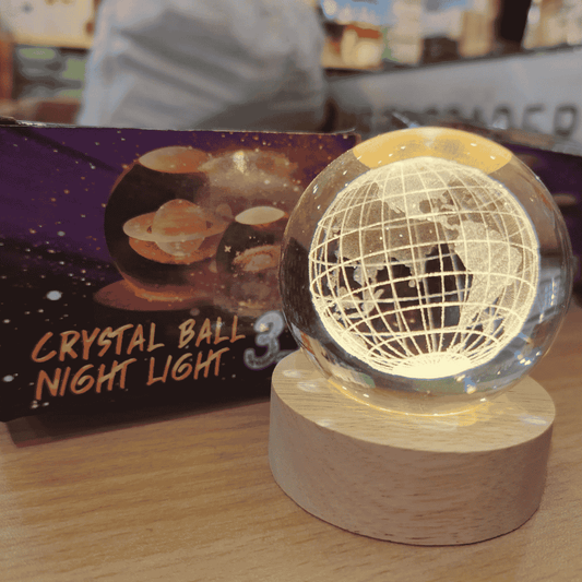 Decorative lamp and box side-by-side for display